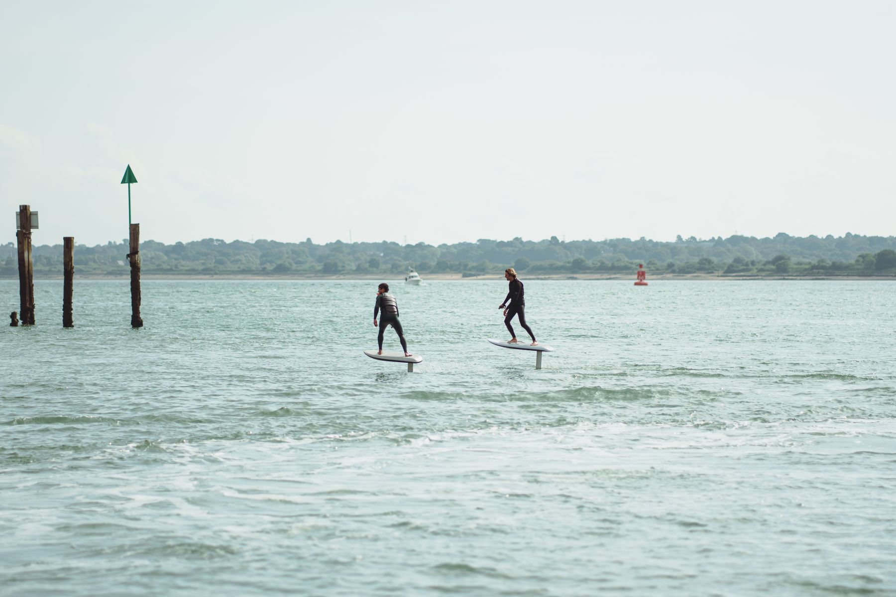 Two people eFoiling